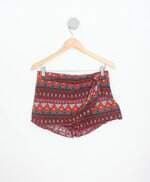 shorts feminino estampado com sobreposição
