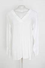 blusa feminina branca com barra mullet e transparência