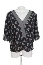 Blusa Shoulder preta floral