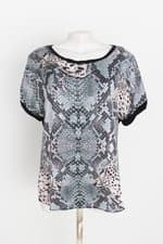 blusa indumentaria feminina estampada com recortes