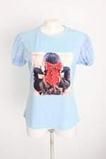 blusa feminina estampada com aplique