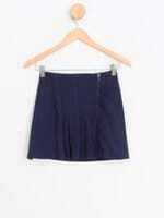 mini saia C&A feminina azul com pregas