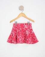 saia zara kids rosa com folhagem e sobreposição