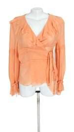blusa alcaçuz feminina laranja com franja e sobreposto