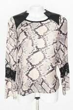 blusa manga longa dani holzbach feminina estampada com recortes e renda