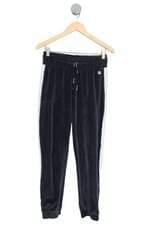 calça de tecido vestem feminina azul com recortes