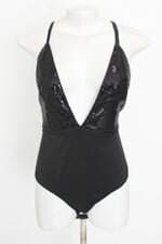 body feminino preto com paetê