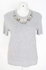 camiseta alexander mcqueen feminina cinza com aplique