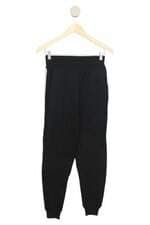 Calça de tricô Caos preta com recortes