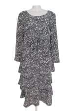 Conjunto duas peças preto floral com babado