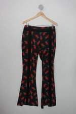 Calça de tecido animale feminina preta floral 