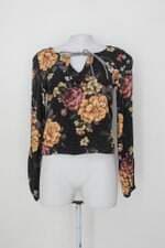 Blusa renner feminina com mix de estampa floral com poá
