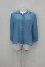 Camisa feminina azul com Transparência