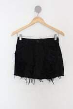 Minissaia isa caritá feminina preta