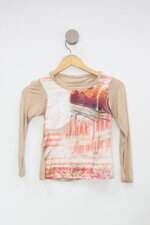 Blusa Infantil estampada com recortes 