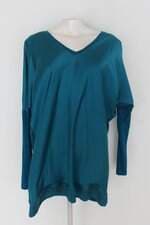 Blusa tirangulo feminina azul com Recortes